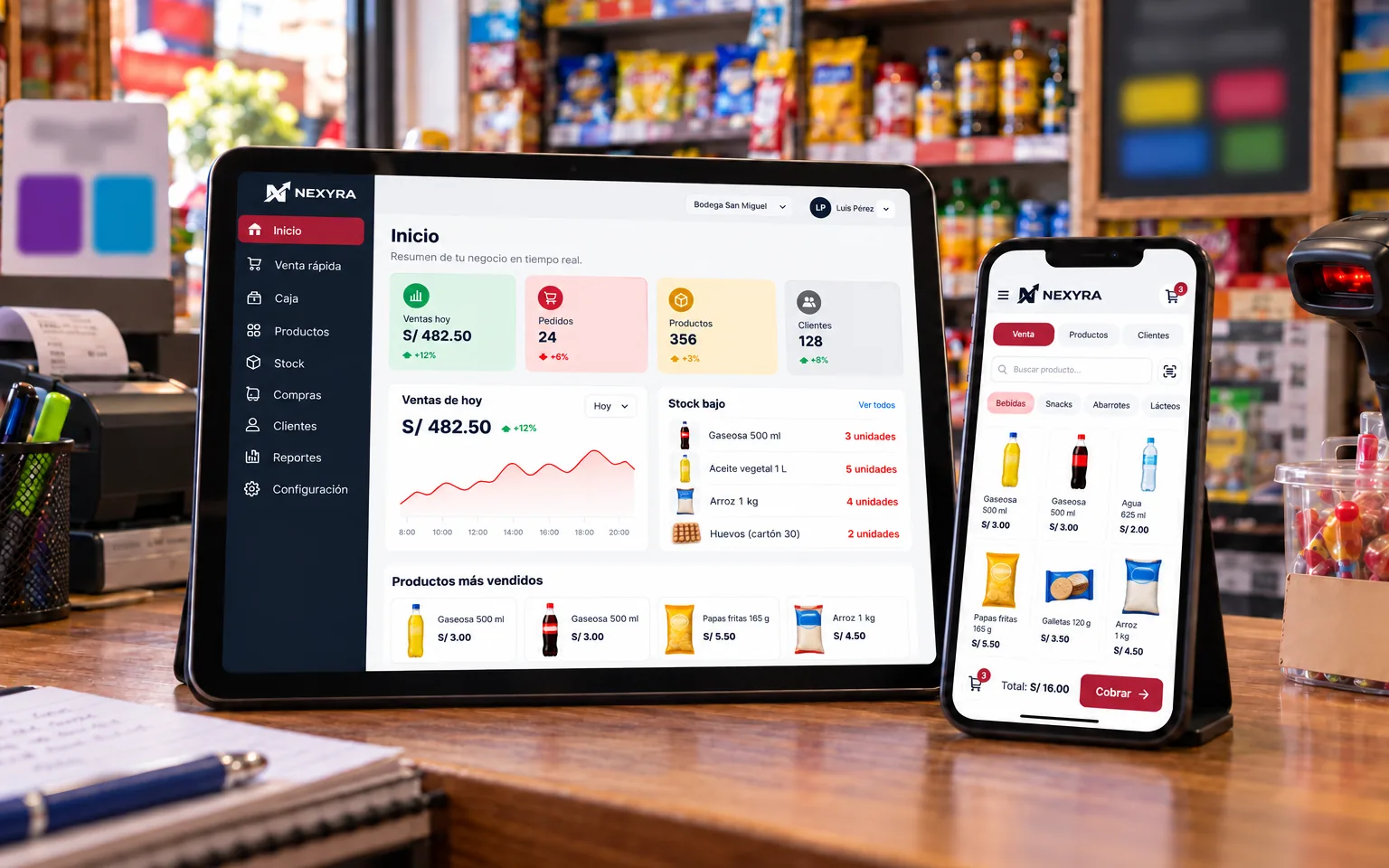 Sistema de tienda en una tablet y un celular sobre el mostrador de una bodega